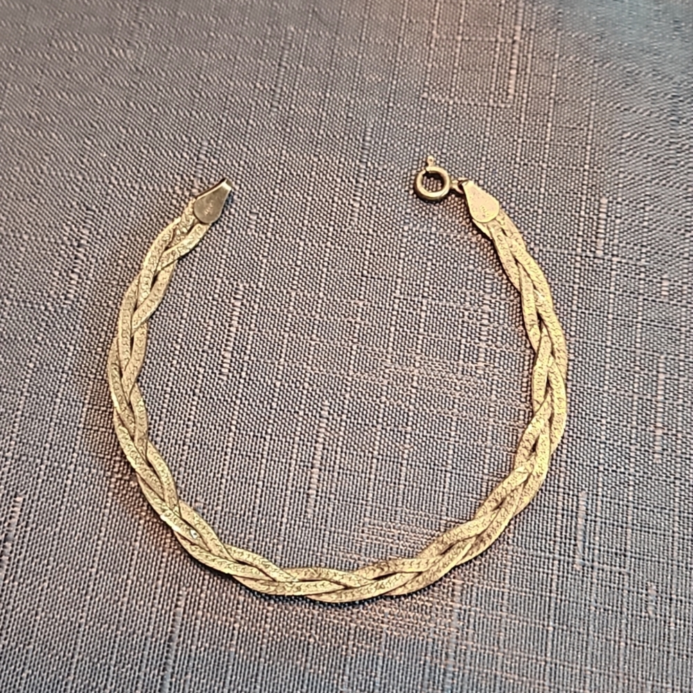 Sterling silver herringbone twist bracelet.
